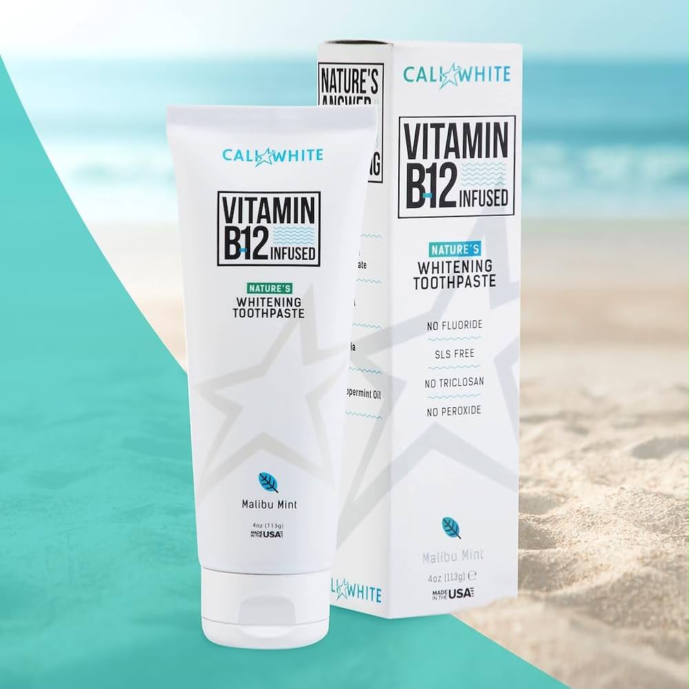 Cali White Vitamin B12 infused toothpaste tube and box on beach background